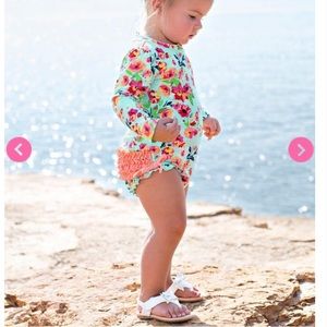 Ruffle Butts one piece rashguard